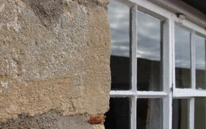 Thick stone walls and single-glazing. A challenge!