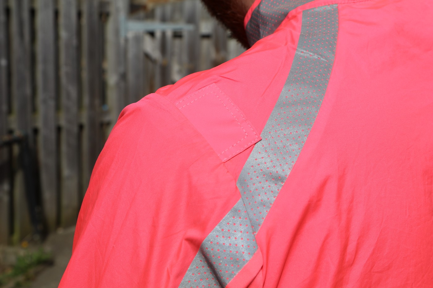 The torn shoulder seam was repaired with a small patch. Maybe epaulettes will make a comeback in cycling?